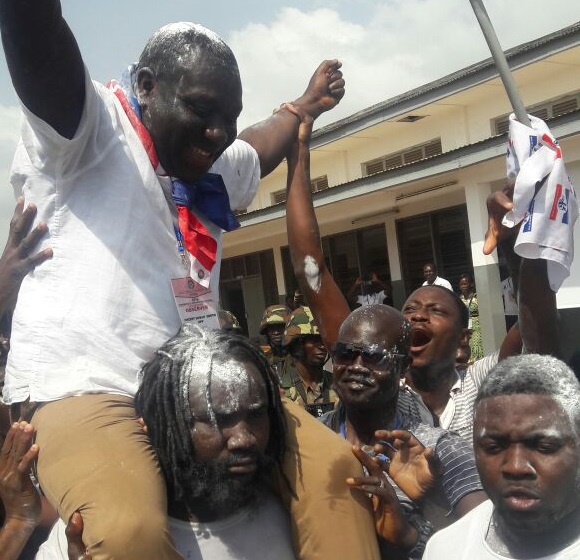Vincent Sowah Odotei enjoys a shoulder ride
